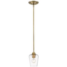 an antique brass finish pendant light with clear glass shades and a single bulb hanging from the ceiling