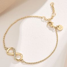 This elegant bracelet is the perfect reminder to show her how loved she is, the 18K Gold Infinitely Yours Bracelet with shimmering crystals is the perfect gift for women from Gifts Australia Jewels Galaxy, Infinite Bracelet, Diamond Alternatives, Infinity Symbol, Crystal Chain, Elegant Bracelet, Personalized Leather, Online Gifts, Beauty Gift