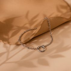 Discover our elegant Minimalist Circle Bracelet, boasting a detachable hinged circle that adds a personalized charm to your ensemble. Whether layered with other bracelets or worn solo, its timeless design effortlessly elevates any outfit, making it a must-have accessory for every occasion ♡ Finish/Material: 18K Gold Over Brass ∙ Rhodium Over Brass Featuring a ~12mm Circle Link Pendant with a Hinged Clasp on ~6.5 inch Rolo Link Chain Part of our Bracelet Collection SKU: RR-BR061 Everyday Round Charm Bracelet Jubilee Style, Everyday Chain Bracelet With Toggle Clasp, Timeless Round Bracelets For Everyday, Elegant Round Chain Bracelet With Toggle Clasp, Timeless Everyday Chain Bracelet, Timeless Round Chain Bracelet For Everyday, Timeless Everyday Round Chain Bracelet, Elegant Metal Charm Bracelet With Delicate Chain, Elegant Chain Bracelet With Toggle Clasp For Everyday