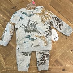 Super Soft And Cozy Boys Sweatshirt And Pant Dinosaur Set! Casual Cotton Bottoms With Dinosaur Print, Casual Dinosaur Print Bottoms For Playtime, Casual Green Dinosaur Print Sets, Dinasour Pajamas, Cotton Long Sleeve Sets With Dinosaur Print, Dinisaur Hot Pajama Sets, Cotton Long Sleeve Dinosaur Print Set, Cotton Dinosaur Print Sets With Short Sleeves, Purple Pajamas