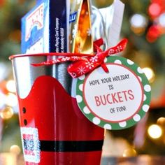 a red cup filled with lots of holiday items