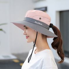 This wide brim hat offers protection from the sun and harmful UV rays. It's made of a quick-dry polyester with breathable mesh panels, perfect for warm summer weather or hot days at the beach. The ponytail hole is located at the back of the hat, allowing you to wear your hair up on summer days. An adjustable chin strap ensures a secure fit and prevents the hat from blowing away in the wind. This hat is great for fishing, hiking, beach days, travel, and more. Quick-dry polyester and breathable me Hiking Hats, Skin Burns, Fisherman's Hat, Outdoor Cap, Ponytail Hat, Summer Sun Hat, Travel Hiking, Fishing Hat, Fisherman Hat