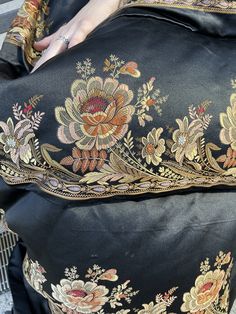 "Victorian Beautiful embroidered jacket and skirt. lace details of sheer fabric on end of the sleeves chord embroidery around the neck and cloth buttons down the front of the jacket ending with a point. Skirt has 3 panel in the front of the skirl, flowers of gold and cream patterns all around. One pocket on the right, bustle in the back of skirt. hook and eye closer. absolutely fantastic, a museum piece , one of a kind. Shoulder 14.5\" Bust 16.5\" Waist 13.75\" sleeves 20.5\" and sheer part is 8 Elegant Silk Embroidered Shawl Fabric, Elegant Silk Embroidered Shawl, Elegant Festive Floral Embroidered Fabric, Elegant Floral Embroidered Fabric Shawl, Elegant Floral Embroidered Shawl, Elegant Floral Embroidered Fabric For Traditional Ceremonies, Elegant Brocade Fabric With Traditional Embroidery, Silk Floral Embroidered Fabric For Formal Occasions, Elegant Ceremonial Silk Embroidered Fabric