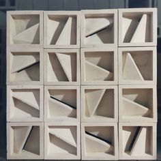 a group of white blocks with different shapes and sizes on them, all stacked together