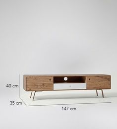 a wooden tv stand with measurements for the top and bottom drawers on each side,