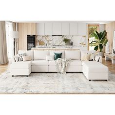 a large white sectional couch in a living room