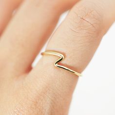 +FREE SHIPPING WTHIN AUSTRALIA OVER $50+ PROMOTION CODE OVER50FREESHIPPING +FREE WORLDWIDE SHIPPING OVER AUD$120+ PROMOTION CODE OVER120FREESHIPPING -Product details- Hand-made solid 14K / 18K gold ring. This ring suits both female and male. This simple and natural design is perfect to layer and pair with other rings.  A great everyday companion. The ring is highly polished as shown in the photo.  *This is a hand made to order item. It will take 5-9 working days to make and polish it. Her Banana Gold Wavy Rings For Gifts, Wavy Gold Rings For Gift, Minimalist Wavy Rings For Gift, Minimalist Wavy Rings As A Gift, Minimalist Wavy Rings As Gifts, Minimalist Wavy Yellow Gold Jewelry, Gold Wavy Jewelry For Everyday, Everyday Yellow Gold Wavy Jewelry, Everyday Wavy Yellow Gold Jewelry