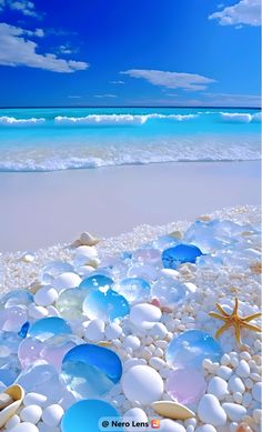 blue and white bubbles on the beach with starfish