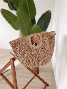 "Woven Moon Straw Bag" Natural Straw Pouch Bag With Detachable Handle, Trendy Natural Color Hobo Bag In Pouch Shape, Trendy Natural Color Hobo Bag Pouch, Natural Pouch Straw Bag With Detachable Handle, Chic Woven Beach Bag With Round Handle, Trendy Crochet Bag With Detachable Handle For Vacation, Trendy Crochet Vacation Bag With Detachable Handle, Woven Pouch Satchel For Vacation, Trendy Beige Straw Bag With Round Handle