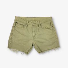 "Gender:Womens  Vintage Levi's 511 cut off denim shorts in khaki green with a zip fly. Waist measures size W32. Made from cotton blend.  Condition:Excellent  Some distressing to the side seam. Please see pictures.  Measurements:     Waist: 32\"   Leg Length: 4\"" Green Shorts With Frayed Hem, Green Bottoms With Frayed Hem In Short Length, Green Cutoff Cotton Jean Shorts, Green Cotton Cutoff Jean Shorts, Green Cutoff Shorts With Pockets, Denim Scraps, Jean Vintage, Cut Off Jeans, Short Jeans