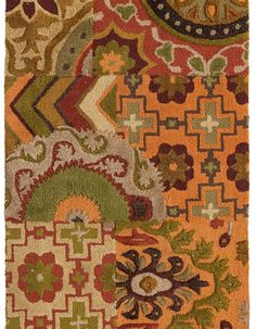 an area rug with many different colors and patterns