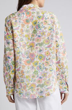 This oversized Italian-linen button-up has a high-low hem for added coverage and a button placed at the fullest part of the chest. 27" length (size Medium) Front button closure Spread collar Long sleeves with one-button cuffs Chest patch pocket 100% linen Machine wash, tumble dry Imported Spring Linen Blouse With Floral Print, Multicolor Linen Tops For Spring, Multicolor Spread Collar Blouse For Spring, Multicolor Long Sleeve Linen Tops, Oversized White Floral Print Blouse, Spring Daywear Blouse With Spread Collar, Oversized White Blouse With Floral Print, Cream Spread Collar Shirt For Spring, Spring Linen Blouse With Button Cuffs