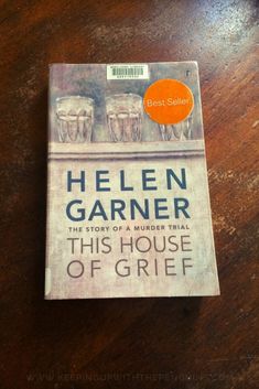 this house of grite by helen garner is sitting on a wooden table