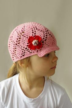 Stylish lace kids summer visor hat or cap is crocheted from beautiful pink  100% cotton yarn. This is a great hat for spring and summer, protecting your toddler head for sun. Girls sun hat is decorated with red crocheted poppy flower.Size: kids, toddlers (ages 2 - 6)Hight: 15 cm( about 6")Head circumference 20-20,5" (around 50-52 cm)Little bit strchy.Care: Hand wash in cool water. Lay flat to dry. Reshape while damp. No dryer!Ready to ship. Cute Crochet Cap For Spring, Cute Adjustable Brimmed Crochet Hat, Handmade Cute Sun Hat For Spring, Cute Handmade Cotton Hat, Crochet Cotton Yarn Sun Hat Cap, Pink Crochet Hat Made Of Yarn As A Gift, Cute Adjustable Handmade Sun Hat, Cute Spring Crochet Cap, Cute Cotton Crochet Hat For The Beach