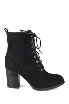 Show off a trend-setting look with heeled Granny booties by Journee Collection. Faux suede uppers rise above the ankles and highlight a front lace-up design. Chunky stacked high heels add modern style to finish the look. Sizing: True to size. Round toe. Lace-up vamp. Inner zip closure. Approx. 2.75" heel height. Approx. 6" shaft height, 11.5" opening circumference. Imported Winter Lace-up Boots With Stacked Heel, Winter Lace-up Suede Heeled Boots, Lace-up Suede Heeled Boots For Winter, Fall High Heel Lace-up Boots With Stacked Heel, Trendy Suede Lace-up Heeled Boots, Fall High Ankle Heeled Boots With Laces, Fall Lace-up Platform Boots With Stacked Heel, Trendy Lace-up Boots With Stacked Heel, Fall Lace-up Suede Mid-calf Boots