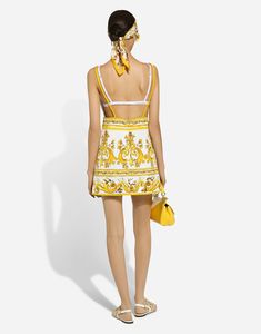 Short majolica-print brocade dress with straps: White and Yellow V-neck Sleeveless with spaghetti straps Stretch silk crepe de chine lining Rear zipper and hook-and-eye fastening The piece measures 45 cm from the waist down on a size IT 40 The model is 175 cm tall and wears a size IT 40 Made in Italy Majolica Print, Wide Leg Jeans Cropped, Dress With Corset, Brocade Dress, Straight Leg Jeans Men, Brocade Dresses, Dolce Gabbana Dress, Fur Coats Women, Leopard Print Blouse