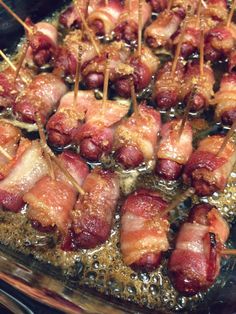 bacon wrapped chicken bites on skewers with toothpicks