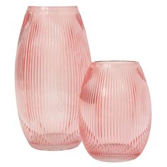 two pink glass vases sitting next to each other