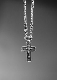 This stunning reflection of faith is what your collection has been missing. Crafted from sterling silver, this exquisite Orthodox cross necklace is the perfect way to honor your devotion. A gleaming reminder of faith and love, it will provide a timeless elegance for years to come. Size: 26"Metal: 925 Sterling SilverFinish: High PolishClosure: Lobster clasp 100% HANDMADE! Processing time 1-3 business days Spiritual White Gold Crucifix Necklace, White Gold Crucifix Necklace Spiritual Style, Spiritual White Gold Crucifix Cross Necklace, White Gold Crucifix Necklace, Spiritual White Gold Cross Pendant Necklace, Elegant Sterling Silver Crucifix Necklace, Classic Sterling Silver Cross Charm, Silver Cross Necklace With Sterling Clasp, Silver Cross Pendant Necklace With Sterling Silver Clasp