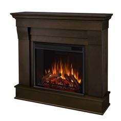 an image of a fireplace with fire in it's side and flames on the sides