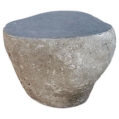 a concrete table with a blue top on a white background for use as a decoration