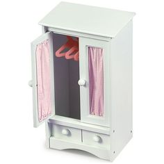 a white doll's armoire with pink curtains on the top and bottom shelf