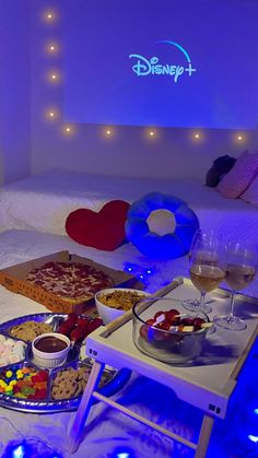 a bed room with a tray of food on it