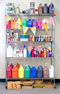 a metal shelf filled with lots of bottles and containers