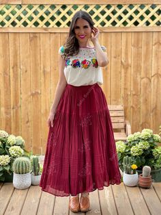 This beautiful and unique Maxi Skirt is not only stylish but is comfortable with elastic around the waist. You can mix and match this skirt with different tops to create so many cute looks! Note: This skirt comes in one size which fits sizes Small, Medium and Large. Bohemian Ruffled Midi Skirt, Multicolor Folk Skirt For Spring, Bohemian Red Ruffled Skirt, Bohemian Red Full Skirt, Red Ruffled Bohemian Skirt, Red Bohemian Ruffled Skirt, Red Hippie Skirt For Summer, Summer Folk Style Multicolor Skirt, Bohemian Ruffled Skirt For Summer