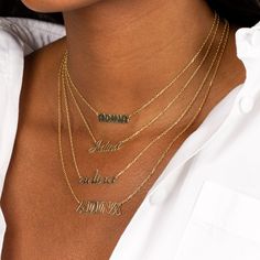 Flaunt the carefree side of your personal style with Adina's Flat Bubble Name Necklace, featuring a flattened, bubble-font nameplate that dangles from a slim chain. Customize this beauty with the word or name of your choosing. It makes quite the statement on its own but really brings on the "wow" factor when you wear it with another personalized necklace and a couple of chokers. Product Details Made from Sterling Silver Gold Plated Nameplate Size: 6 MM X 22 MM Length: 17"+ 2" This Product Requir Trendy Personalized Name Necklace For Everyday, Trendy Custom Name Necklace For Everyday, Trendy Everyday Custom Name Necklace, Trendy Everyday Customizable Necklaces, Customizable Modern Nameplate Jewelry, Modern Customizable Nameplate Jewelry, Everyday Nameplate Necklace With Names, Trendy Name Necklace For Personalized Gift, Everyday Nameplate Necklace