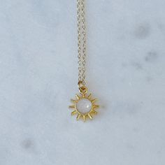 Dainty pearl sun charm necklace Gold Necklace With Pearl Pendant For Summer, Sun-shaped Necklace For Summer Gifts, White Sun And Moon Design Necklace, White Adjustable Charm Necklace With Pearl Pendant, Dainty Charm Necklace With Delicate Chain For Summer, Summer White Necklaces With Pearl Pendant, Dainty Charm Necklaces With Delicate Chain For Summer, Summer White Necklace With Pearl Pendant, Dainty Sun Design Necklace For Everyday