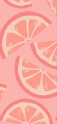 an orange slice is shown on a pink background