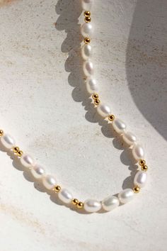 Merci Pearl Necklace - Complete. Studio Pearl Necklace Photography, Necklace Photography, Small Pearl Necklace, Resort Jewelry, Classic Pearl Necklace, Knot Bangle, River Pearls, Natural Gemstone Necklace, Pearl Necklace Designs