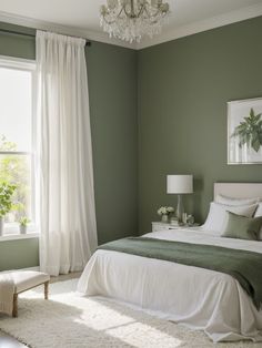 a bedroom with green walls and white bedding, chandelier, window, and rug