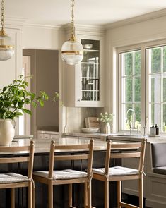 the kitchen is clean and ready to be used as a dining room or breakfast nook