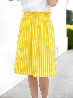 Looking for a versatile skirt that can take you from day to night effortlessly? Our Striped Tracie Skirt in Yellow is the perfect addition to your wardrobe! Crafted with a simple yet stylish design, this skirt features a comfy waistband that ensures you stay comfortable throughout the day. Whether you're running errands, attending a meeting, or going out for a night on the town, the Tracie skirt has got you covered. Available in sizes Small to 3X, this skirt is perfect for all occasions and body Spring Pencil Skirt For Day Out, Lined, Spring Pencil Skirt With Lined Skirt For Day Out, Spring Pencil Skirt With Lining For Day Out, Flowy Skirt With Elastic Waistband For Day Out, Day Out Lined Pencil Skirt, Flared Skirt With Elastic Waistband For Day Out, Relaxed Skirt With Elastic Waistband For Day Out, Summer Banded Waist Relaxed Maxi Skirt, Tiered Skirt With Elastic Waistband For Work