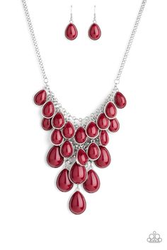 Tinted in the classic rich hue of Wine, polished red teardrops gradually increase in size as they trickle along rows of interconnected mesh chain. The robust beads drip into a tapered shape, creating a dramatic fringe below the collar. Features an adjustable clasp closure. Sold as one individual necklace. Includes one pair of matching earrings. P2ST-RDXX-058XX Pink Jewels, Red Necklace, Teardrop Beads, Paparazzi Accessories, Teardrop Necklace, Blue Necklace, Paparazzi Jewelry, Red Bead, Short Necklace