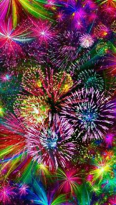 colorful fireworks in the sky with lots of colors on them and some green, yellow, red