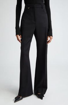 Crisp creases further the polished look of these high-rise wool pants designed in a flare-leg silhouette. 34" inseam; 24" leg opening; 14 1/2" front rise; 17" back rise (size 42) Zip fly with hook-and-bar closure Front scoop pockets 100% wool Dry clean Imported Designer Clothing Flare Leg Pants, Pants Design, Wool Pants, Polished Look, Bottoms Pants, Leg Pants, Womens Bottoms, Designer Clothing, High Waist