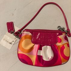 New With Tag Just Need Some Cleaning. Trendy Coach Clutch As Gift, Trendy Pink Wristlet For Spring, Trendy Coach Clutch With Removable Pouch, Chic Pink Clutch Wristlet, Trendy Coach Clutch For Travel, Chic Pink Wristlet For Travel, Trendy Coach Clutch Wristlet, Coin Logo, Purple Clutch