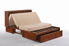 a wooden bed frame with two drawers and a pull out mattress in the bottom drawer