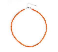 A colorful finishing touch to your outfit of the day, this beaded carnelian necklace brightens up any ensemble. Red Carnelian Beaded Necklace With Faceted Beads, Orange Oval Beaded Necklaces As Gifts, Red Carnelian Faceted Beaded Necklaces, Orange Oval Beaded Necklace For Gifting, Orange Oval Beaded Necklace For Gift, Adjustable Carnelian Jewelry With Faceted Beads, Orange Carnelian Beaded Necklace For Gift, Elegant Orange Crystal Necklaces With Gemstone Beads, Orange Carnelian Gemstone Necklace