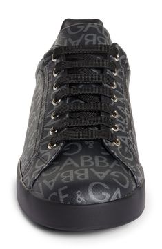 A logo-jacquard upper brings signature D&G flair to a low-top sneaker grounded by rubber cupsole branded at the heel. Removable insole Lace-up style Textile upper/leather lining/rubber sole Made in Italy Men's Designer Shoes Classic Black Sneakers With Logo Print, Designer Low-top Custom Sneakers With Logo Print, Black Embroidered Logo Lace-up Sneakers, Black Lace-up Sneakers With Embroidered Logo, Black Custom Lace-up Sneakers With Embroidered Logo, Black Lace-up Custom Sneakers With Embroidered Logo, Black Custom Sneakers With Embroidered Logo, Designer Black Sneakers With Logo Print, Luxury Black Sneakers With Logo Print