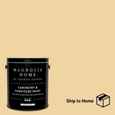 a paint can with the words magnolia home painted on it and an image of a house