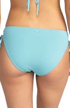 Take a trip to paradise in these solid hipster bikini bottoms with sassy side ties that create chic ruching. Side ties Moderate back coverage Lined 87% recycled nylon, 13% elastane Hand wash, line dry Imported Beachy Tie-side Swimming Bottoms, Blue Tie-side Swimming Bottoms, Solid Color Ruched Tie-side Swimwear Bottom, Beachy Blue Tie-side Swim Bottoms, Blue Tie-side Bottom Swimwear, Roxy, Nordstrom, Take That