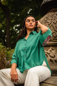 Oversized high-low shirt with dropped shoulders in teal green with wooden buttons and subtle bell sleeves. Elbow patch embellished with preloved Kutchi hand embroidery by the artisan of Kutch, Gujarat. Note: Embroidery patch (color and design) vary in each piece Handcrafted in India Note Embroidery, Kutch Gujarat, High Low Shirt, Iron On Embroidery, Elbow Patch, Embroidery Patch, Blog Instagram, Wooden Buttons, Elbow Patches