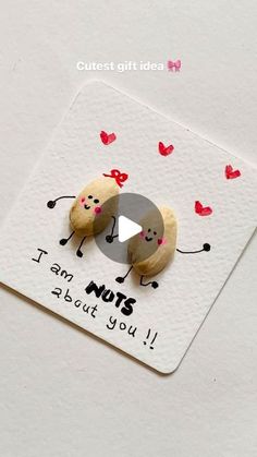 two nuts are on top of a card with the words i am nuts about you