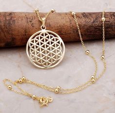 Celebrate your connection to nature with this beautiful Flower of Life Necklace! Crafted with gold plated sterling silver, it symbolizes the unity of all life and reminds us of our interconnectedness. This magical necklace is the perfect way to stay in touch with yourself and the world around you. ✨Details: Made of gold plated 925 sterling silver Pendant is 1" in diameter Chain length is 18" Shipping Times:Canada: 4-7 business daysUnited States: 4-7 business daysWorld Wide: 8-14 business days © In Touch With Yourself, Magical Necklace, Connection To Nature, Sterling Silver Flowers, Instagram And Snapchat, Gold Gilding, Flower Of Life, Divine Feminine, Beautiful Flower