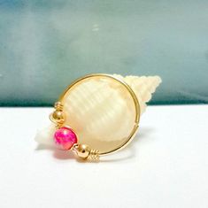 This listing is for ONE endless 14k yellow gold filled hoop with lab.created Pink Rose Opal 3mm and gold filled beads, wrapped with gold filled wire. Perfect for nose, ear, cartilage, lip, septum or other body piercing. Material: 14K Yellow Gold Filled or 925 Sterling Silver Gauge : 16 Gauge(1.2mm), 18 Gauge(1mm), 20 Gauge(0.8mm), 22 Gauge(0.6mm) Inner Diameter: 7mm-tiny, 8mm, 9mm, 10mm, 11mm, 12mm Select your preference in the Gauge & Inner Diameter and Style options at the top right of thi Hypoallergenic Pink 14k Gold Filled Jewelry, Adjustable Pink Huggie Jewelry, Pink Adjustable Huggie Jewelry, Handmade Pink Toe Ring Jewelry, Handmade Pink Toe Ring, Gold Wire Wrapped Cartilage Earrings As Gift, Gold Wire Wrapped Cartilage Earrings For Gift, Pink Wire Wrapped 14k Gold-filled Jewelry, Adjustable Nickel-free Yellow Gold Nose Ring