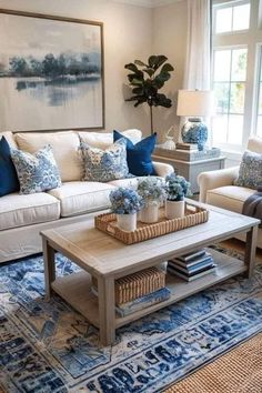 a living room with blue and white decor